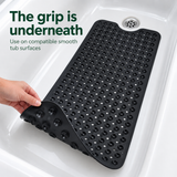 Lifting a corner to show the mat underside